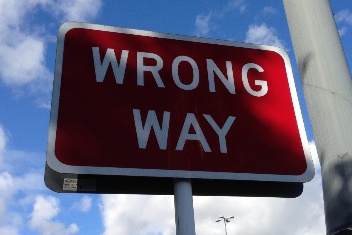wrong way sign road caution warning wrong direction information 1021992